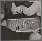 Game of Chinese checkers being played in hotel lobby. San Augustine, Texas