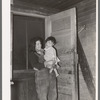 Children of Mexican beet worker. East Grand Forks, Minnesota. Mother is dead and this young girl works in the field and does the housework