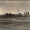 Farmstead, Sheridan County, Montana, with manure pile in the coulee. This is rather common practice. Manure is not usually returned to the soil