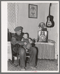 Blaze Gallagher and youngest son in home at Crosby, North Dakota. He was formerly a farmer