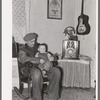 Blaze Gallagher and youngest son in home at Crosby, North Dakota. He was formerly a farmer