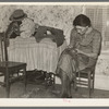 Mrs. Gallagher patching clothes for her children. Wife of former farmer, now living in Crosby, North Dakota