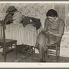 Mrs. Gallagher patching clothes for her children. Wife of former farmer, now living in Crosby, North Dakota