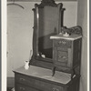 Old dresser in home of Jim Hardin, former promoter. Two Bit Creek, near Deadwood, South Dakota