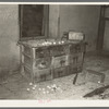 Chemical cabinet in assaying office at Two Bit Creek. Note the cupels for accommodating sample ore, South Dakota