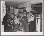 Southeast Missouri Farms. Farmers talking together in cooperative store, La Forge project, Missouri