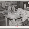 Southeast Missouri Farms. Buying supplies in cooperative store, La Forge, Missouri