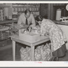 Southeast Missouri Farms. Buying supplies in cooperative store, La Forge, Missouri