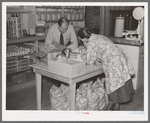 Southeast Missouri Farms. Buying supplies in cooperative store, La Forge, Missouri