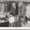Southeast Missouri Farms. Sharecropper's son in corner of shack bedroom, La Forge project, Missouri