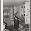 Southeast Missouri Farms. Wife of client in kitchen of new home, La Forge project, Missouri