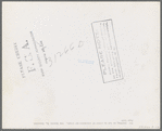 Boy resting on bed in attic of sharecropper shack, New Madrid County, Missouri