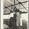 Tightening ropes in raising circus tent. Lasses-White traveling show, Sikeston, Missouri