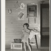 Child of sharecropper in old home. Family will work under the tenant purchase program. Near Caruthersville, Missouri