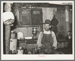 Resident of Tin Town, Caruthersville, Missouri, in his shack home