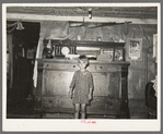 Interior of house of family living in Tin Town, Caruthersville, Missouri