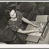 Packaging sacks of rice into cartons. State rice mill, Abbeville, Louisiana