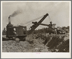 Steam shovel at work at paper mill. Lufkin, Texas