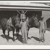 FSA (Farm Security Administration) clients with team in front of barn. Sabine Farms, Marshall, Texas