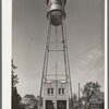 Fire station and water tank. Carthage, Texas