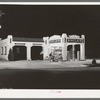 Oil and gasoline service station, San Augustine, Texas, at night