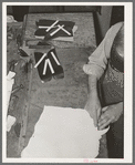 Cutting out the beading for boots. Bootmaking shop, Alpine, Texas. This beading is a binding on the upper part of the boots