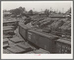 Railroad yards showing stored lumber. Marshall, Texas