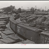Railroad yards showing stored lumber. Marshall, Texas