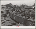 Railroad yards showing stored lumber. Marshall, Texas