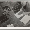 Gluing lining into upper part of boot. Bootmaking shop, Alpine, Texas