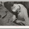 Attaching heel part of boot to uppers. Boot shop, Alpine, Texas