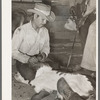 Branding calf. Cattle ranch near Marfa, Texas