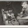 Leather which forms the heel is applied in layers and is filed down for accurate shaping. Boot shop, Alpine, Texas