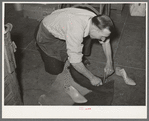 Cutting out of the sole of the boot from pattern traced from last. Bootmaking shop, Alpine, Texas