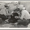 Mexican cowboys washing up after roundup. Cattle ranch near Marfa, Texas