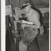 Sewing uppers together. Boot shop, Alpine, Texas