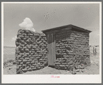 Adobe privy with windbreak. Old "Walking X" Ranch place near Marfa, Texas