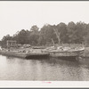 Hulls rotting along the bayou which joins the port of Houston, Texas