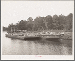 Hulls rotting along the bayou which joins the port of Houston, Texas