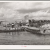 General view of flour mill and docks. Port of Houston, Texas
