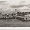 General view of flour mill and docks. Port of Houston, Texas
