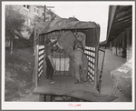 Unloading truckload of cotton. Compress, Houston, Texas