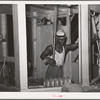 Compressing unit operator. Compress, Houston, Texas