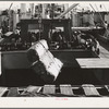 Loading cotton into hold of ship. Port of Houston, Texas