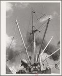 Loading of cotton for export. Notice man operating winch. Port of Houston, Texas