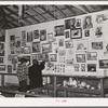 Women looking at art exhibit at Gonzales County Fair. Gonzales, Texas