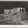 Farmer's automobile with boxes of turkeys on it at cooperative poultry warehouse. Brownwood, Texas