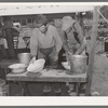 Cowboys of the SMS Ranch washing up for dinner. Ranch near Spur, Texas