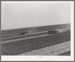 Tractor farming on 4900 acre ranch near Ralls, Texas