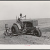 Tractor on large farm near Ralls, Texas